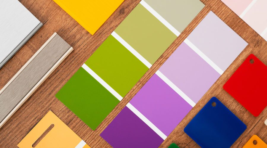 color fandecks and color samples laid out on table